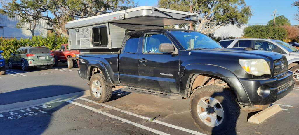 Tacoma with slide in popup camper